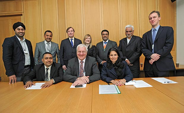 Pictured (clockwise from top left) Rav garcha, Paul Cheema, NFRN public affairs executive Adrian Roper, RN features editor Chris Rolfe, Paul Patel, Mukesh Patel, Rn deputy features editor Tom GK, Priti Patel MP, Peter Wagg and Pinda Cheema at the RN Summit