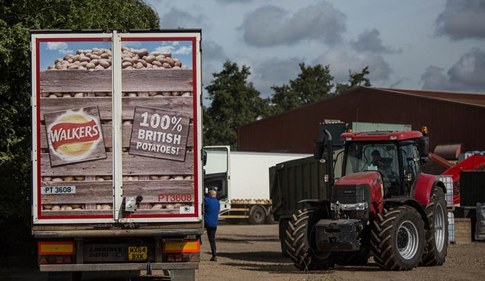 walkers-lorry-with-tractor-on-potato-farm